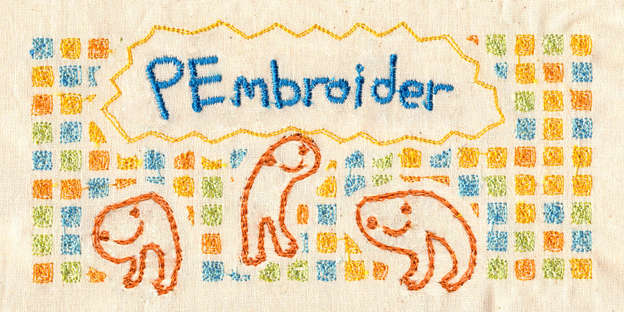 A piece of embroidered textile, decorated with the pembroider logo and small smiling creatures.