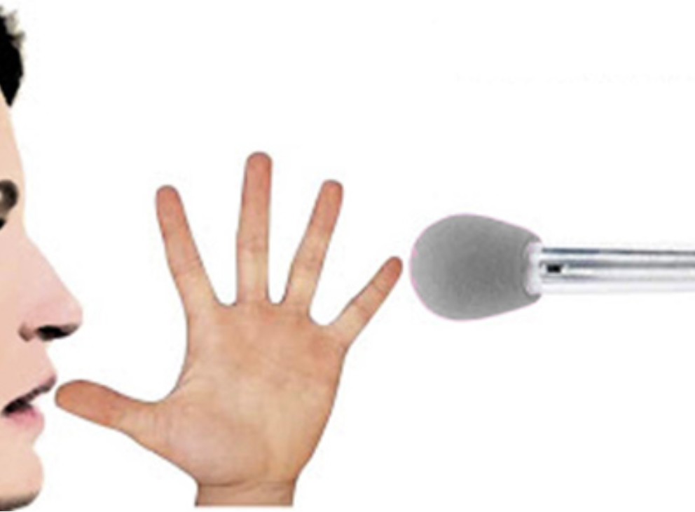 Photo showing a handspan between the mouth and the microphone