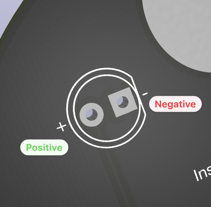 Image highlighting the positive and negative LED connectors on the PCB